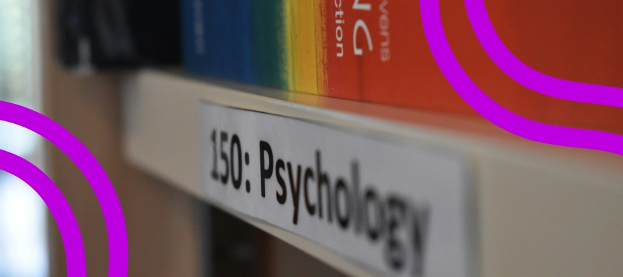 Close-up of a bookshelf with the label ‘Psychology.’